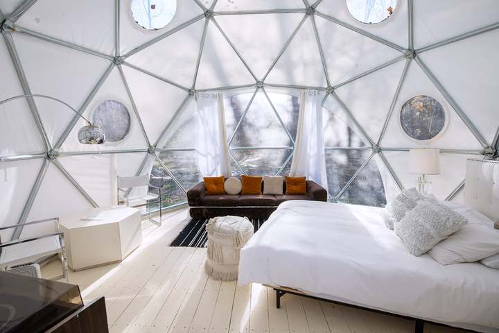 Second dome interior with curtains and daybed